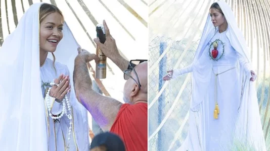 Rita Ora shfaqet në disa poza kontroverse, ndërsa shndërrohet në Virgjëreshën Mari për një set fotografik